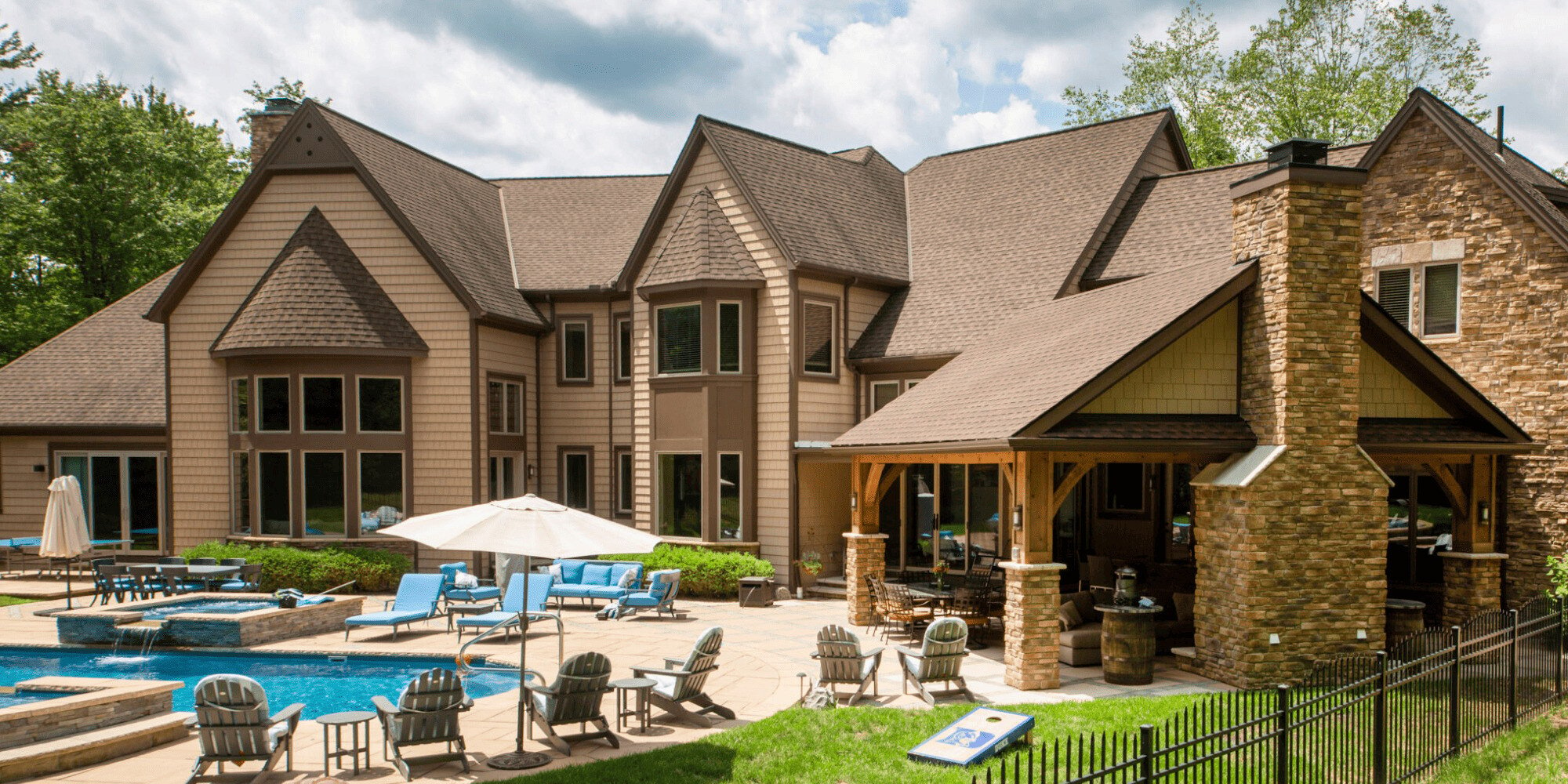 Outdoor Living Area with Pool and Covered Porch in Cleveland