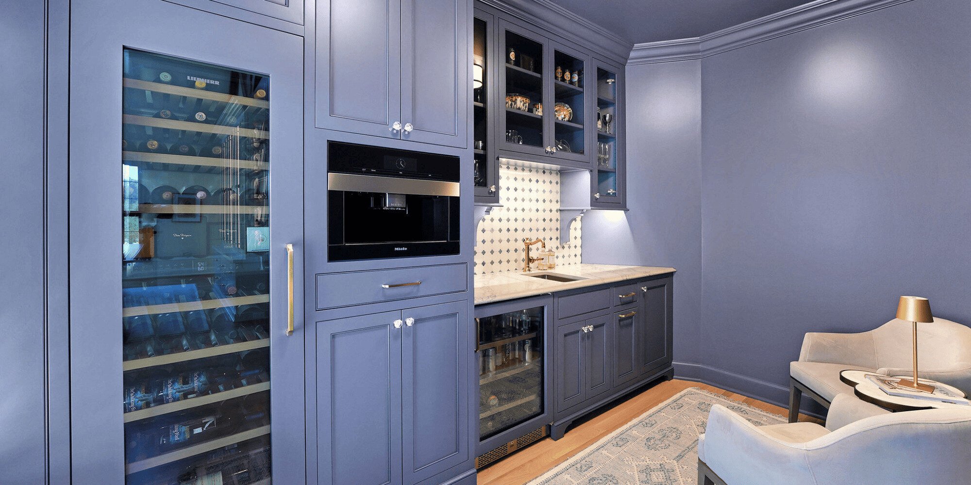 Color Drenched Kitchen with Periwinkle Cabinets and Walls and Built In Appliances