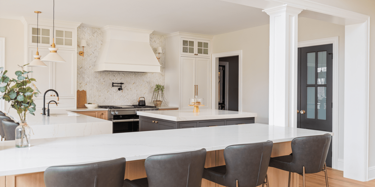 Open Kitchen Wall with Bar Seating and Range Hood