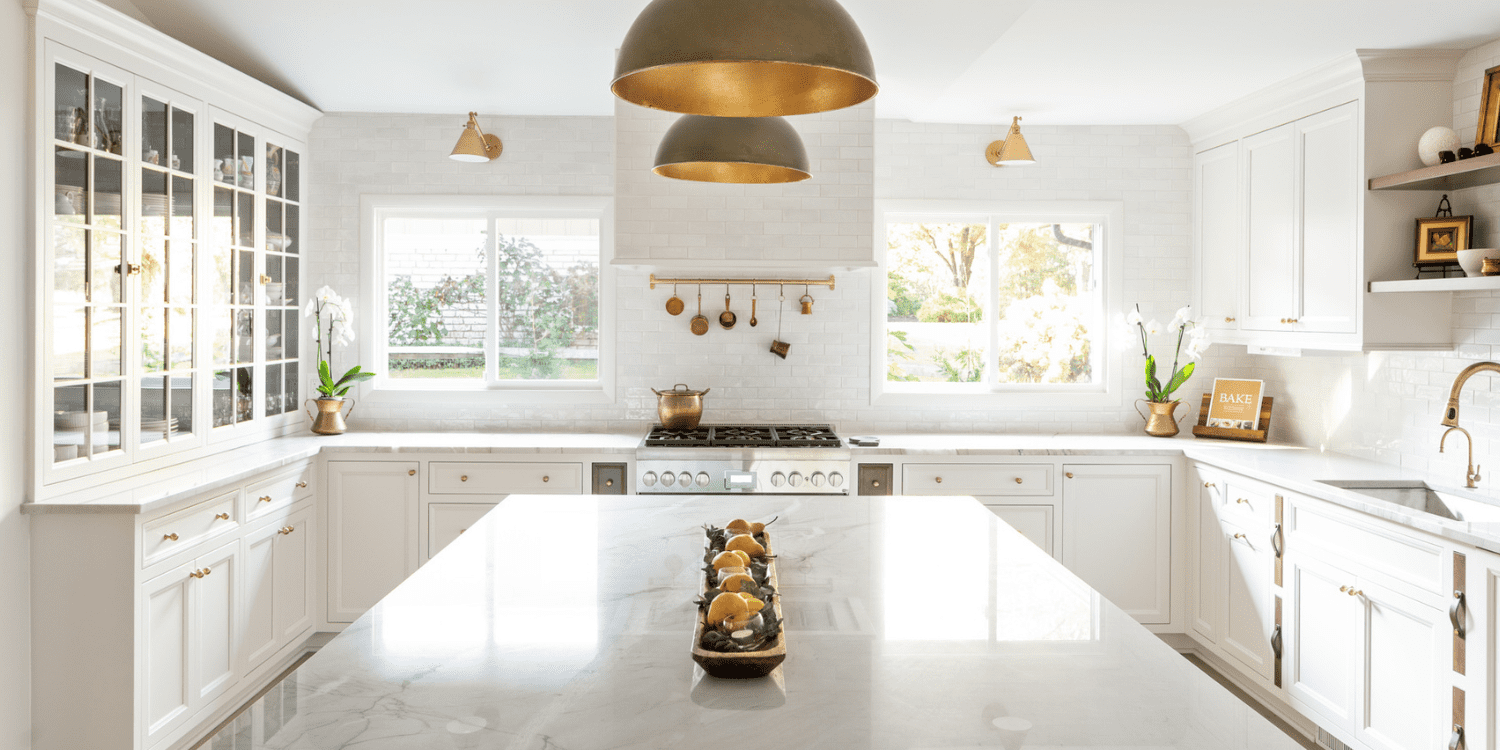 Kitchen With Large Island and Domed Modern Metal Pendant Lights