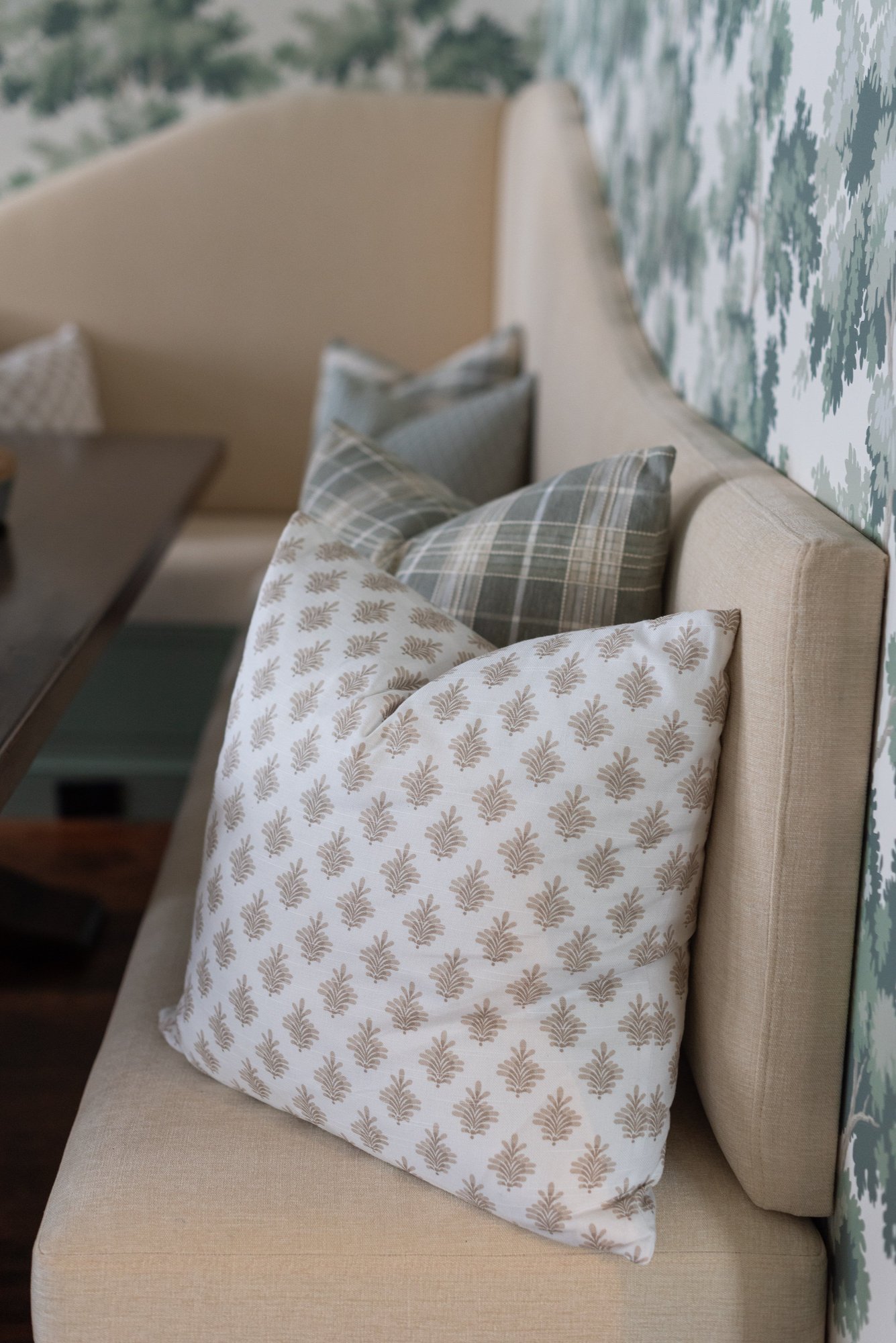 Accent pillows on a beige couch