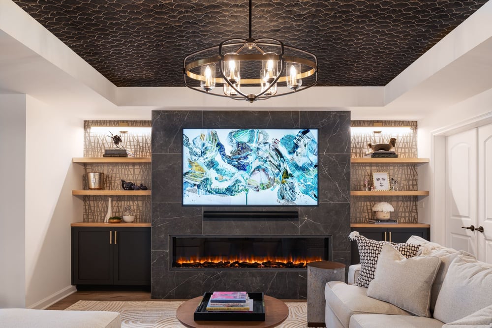 Fireplace with TV and Built In Side Shelves in Chagrin Falls Home Remodel