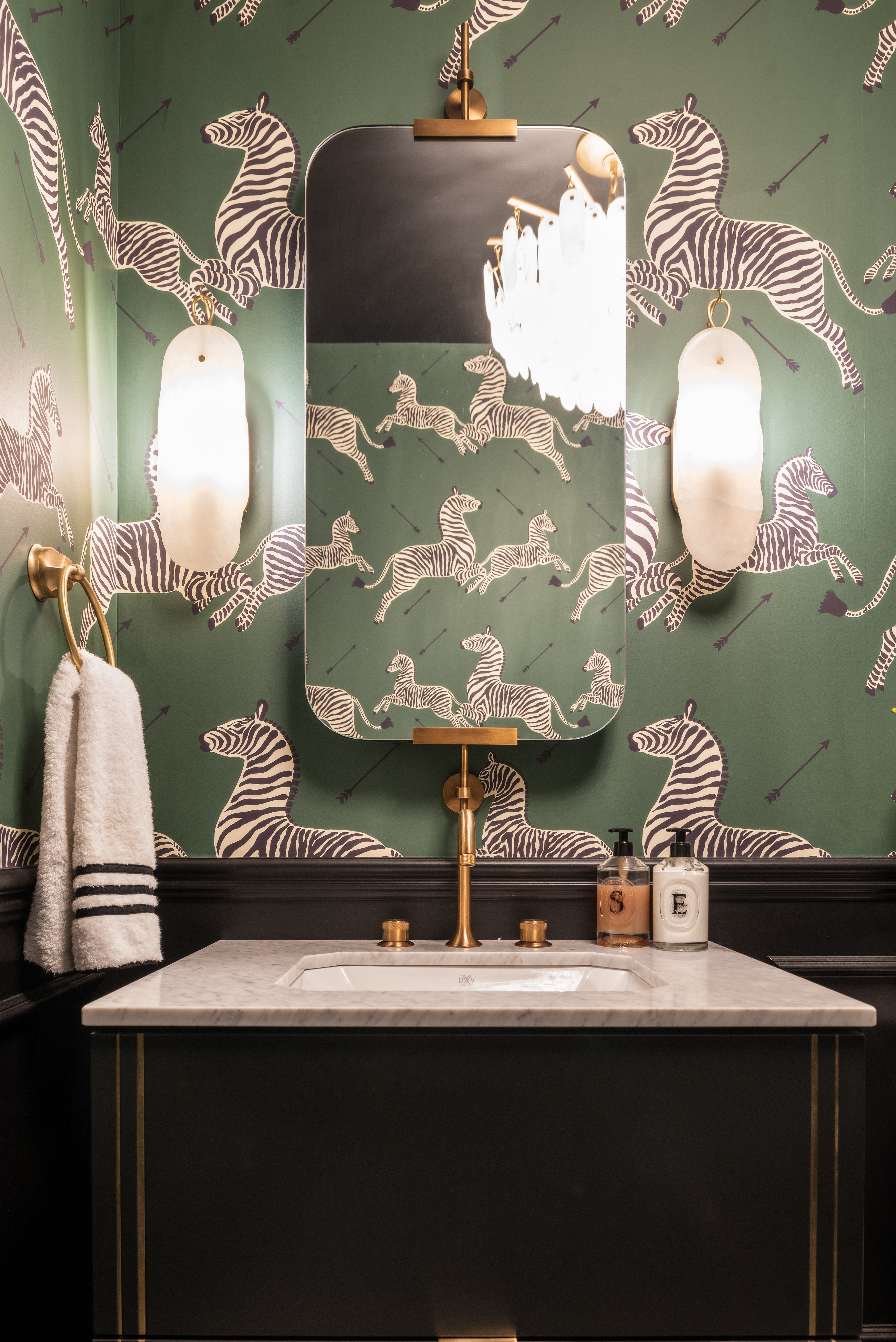 powder bathroom with zebra wallpaper